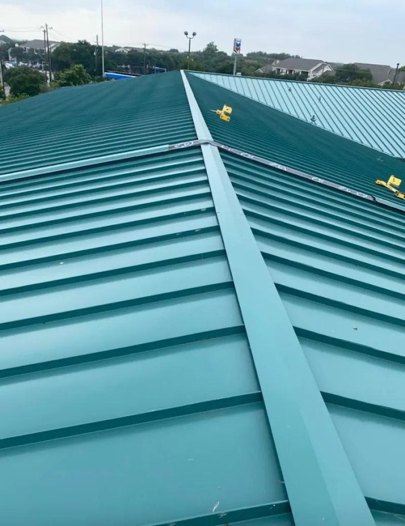 Green commercial metal roof ridge and valley for Metal Roof Repair in Leland